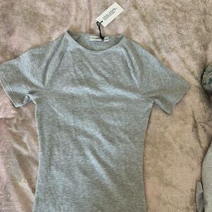 Aritzia grey top never worn with tags size xs